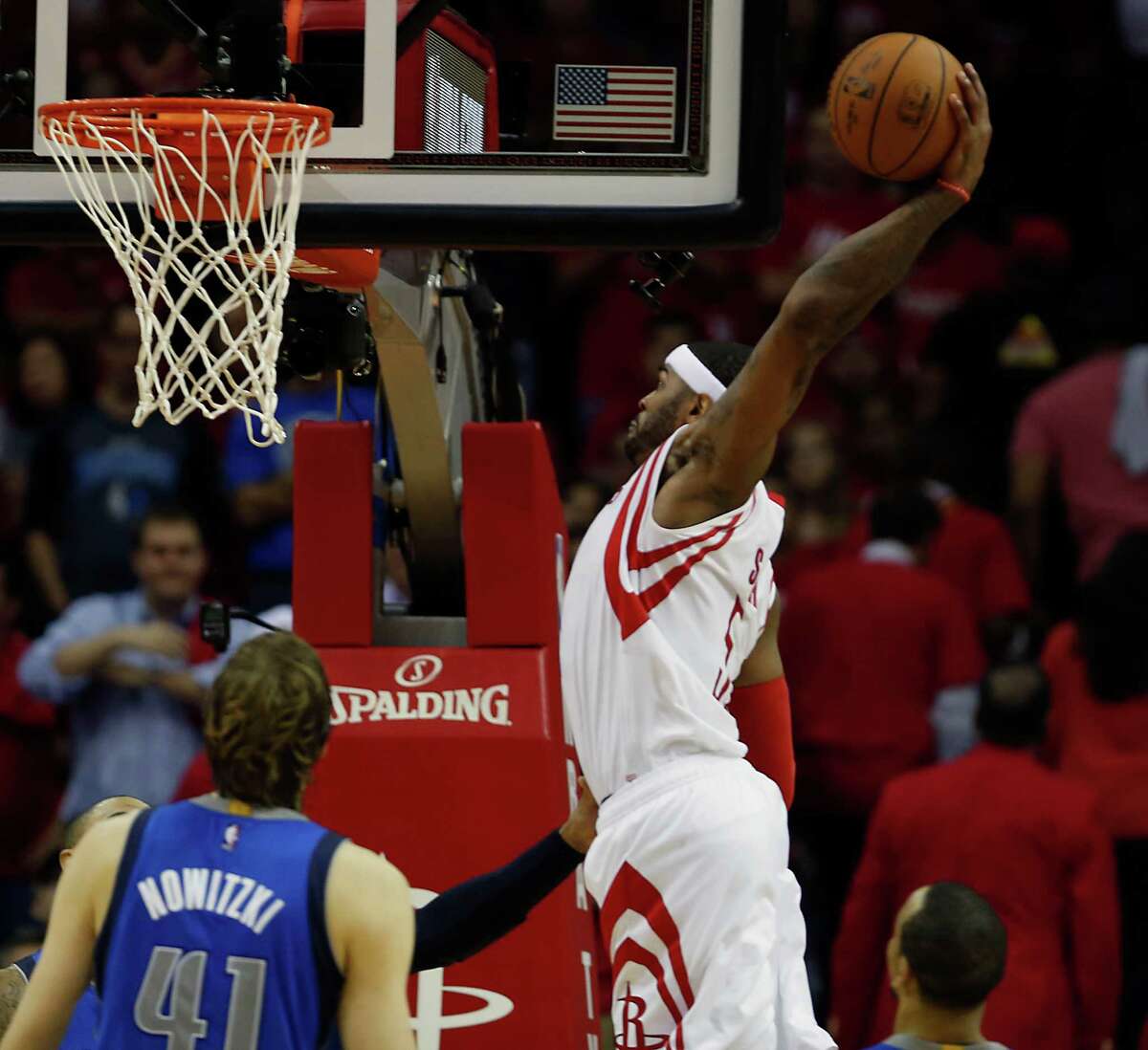 Josh Smith delivers one of the Rockets' 14 dunks in Game 2. Smith finished with 15 points.