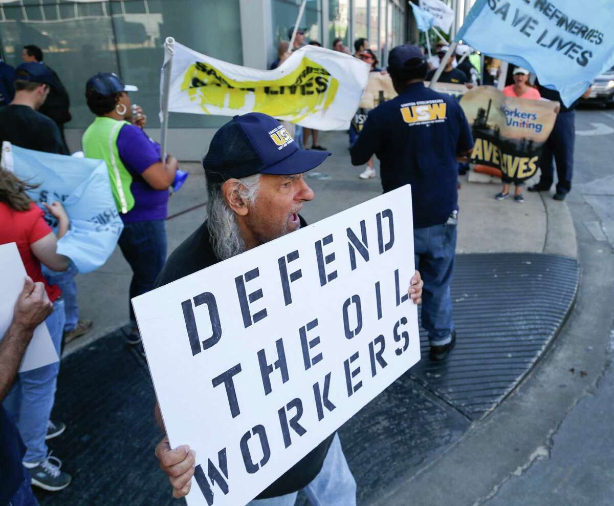 United Steel Workers Union members on strike from Marathon Petroleum's Galveston Bay refinery hold a rally at the CERAweek conference at the Hilton Americas-Houston, Tuesday April 21, 2015. The United Steel Workers Union has been on a nation wide strike since February of this year.