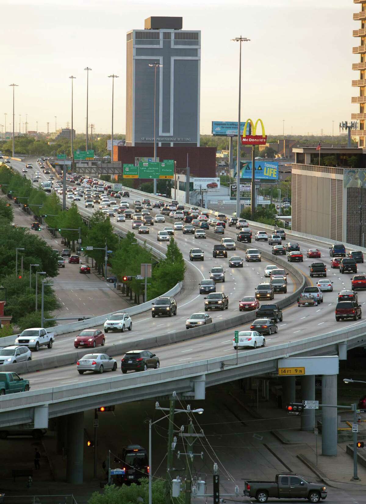 Traffic travels along the Pierce Elevated, Monday, April 20, 2015, in Houston.