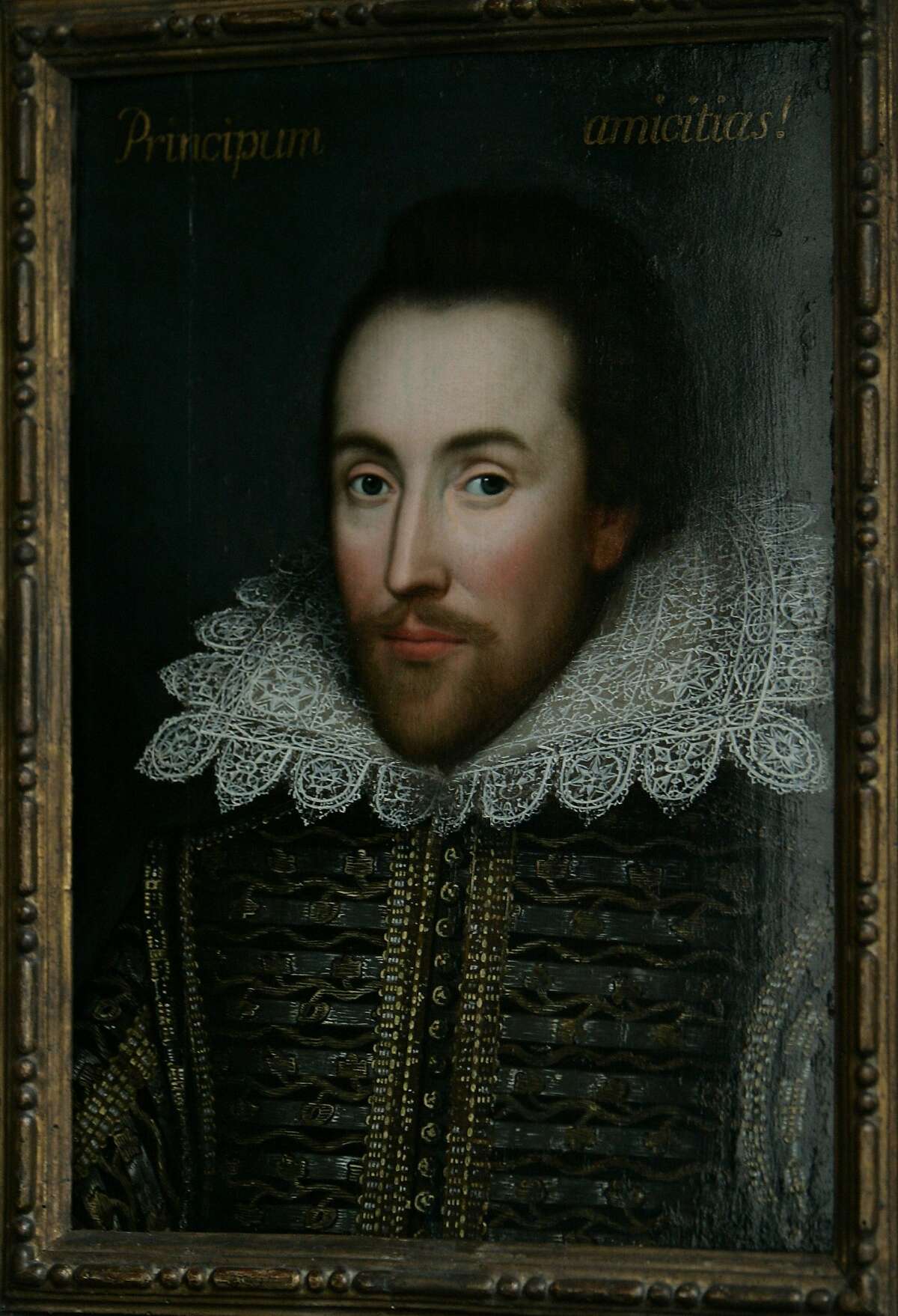 FILE - This is a Monday March 9, 2009 file of a then newly discovered portrait of William Shakespeare, presented by the Shakespeare Birthplace trust, is seen in central London, New research depicts William Shakespeare as a grain hoarder, moneylender and tax dodger who became a wealthy businessman during a time of famine.(AP Photo/Lefteris Pitarakis)