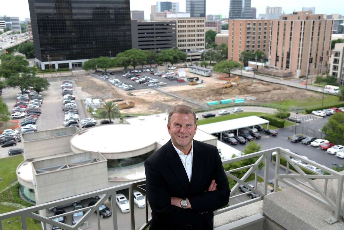Tilman Fertitta poses for a portrait at Landry's headquarters, overlooking the site of his new development along the West Loop Wednesday, April 22, 2015, in Houston. ( Jon Shapley / Houston Chronicle )
