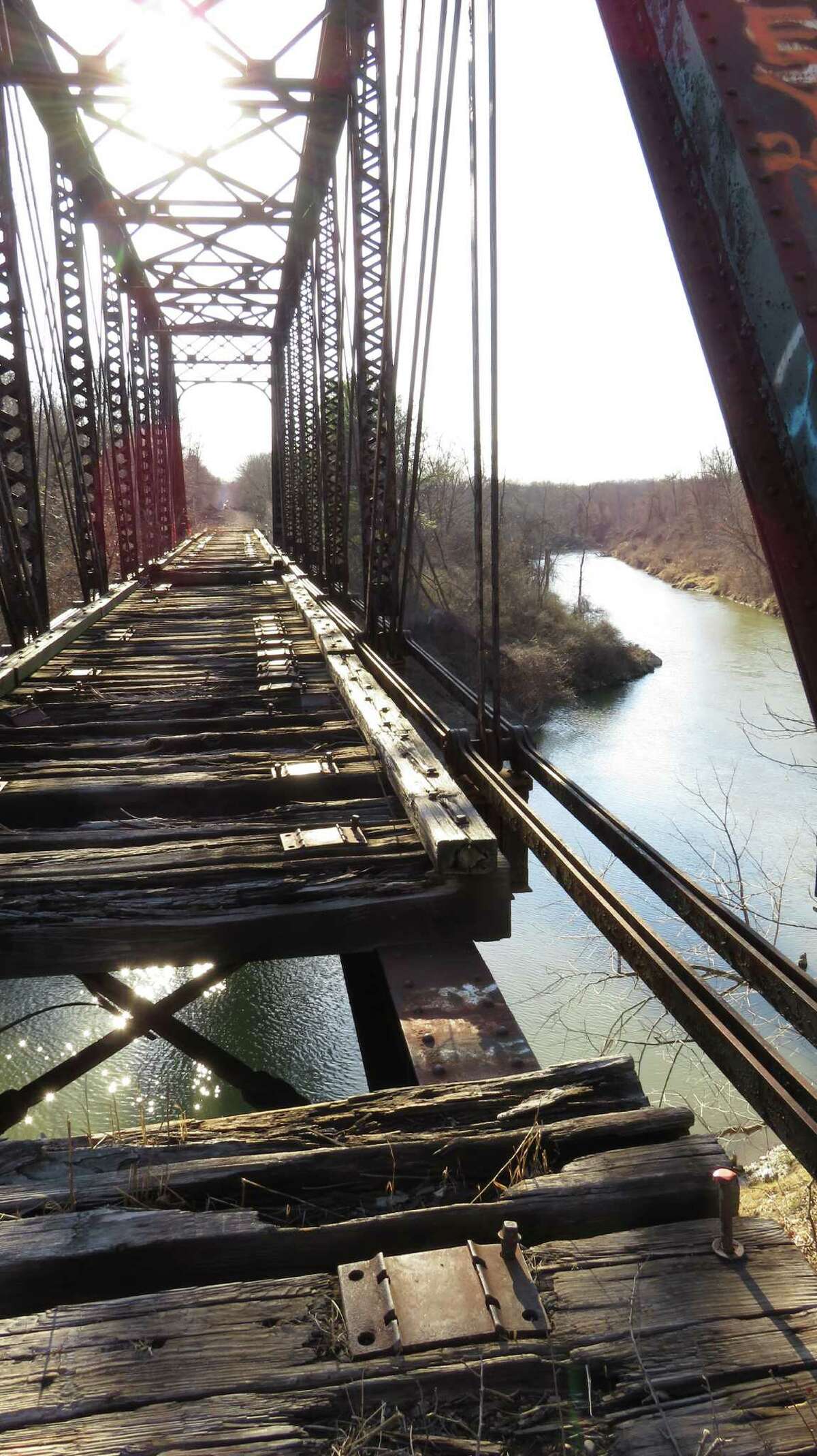 An old railroad bridge over the Normans Kill is slated for repair later this year as part of the development of the Albany County Rail Trail. (Gillian Scott / Special to the Times Union)