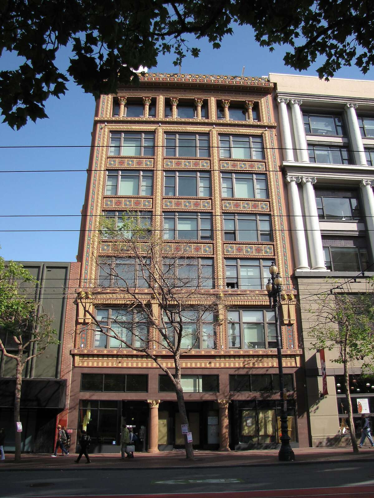 Now known as The Wilson, this seven-story building at 973 Market St. has endured more than a century of ups and downs as the blocks around it changed. The original architects were G.W. Percy and Willis Polk. According to an article when the project was announced in 1900, the inspiration for the tile work was the 6th century Basilica of San Vitale in Ravenna, Italy.