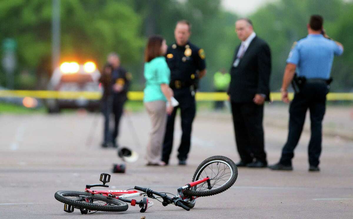 Bicycle rider dies in crash with HPD squad car