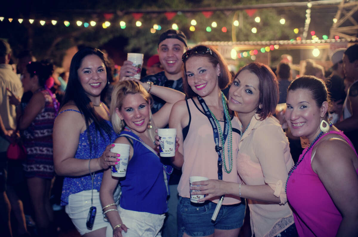 Residents were seen at Night in Old San Antonio, the largest non-parade event during Fiesta, Thursday night, April 24, 2015.