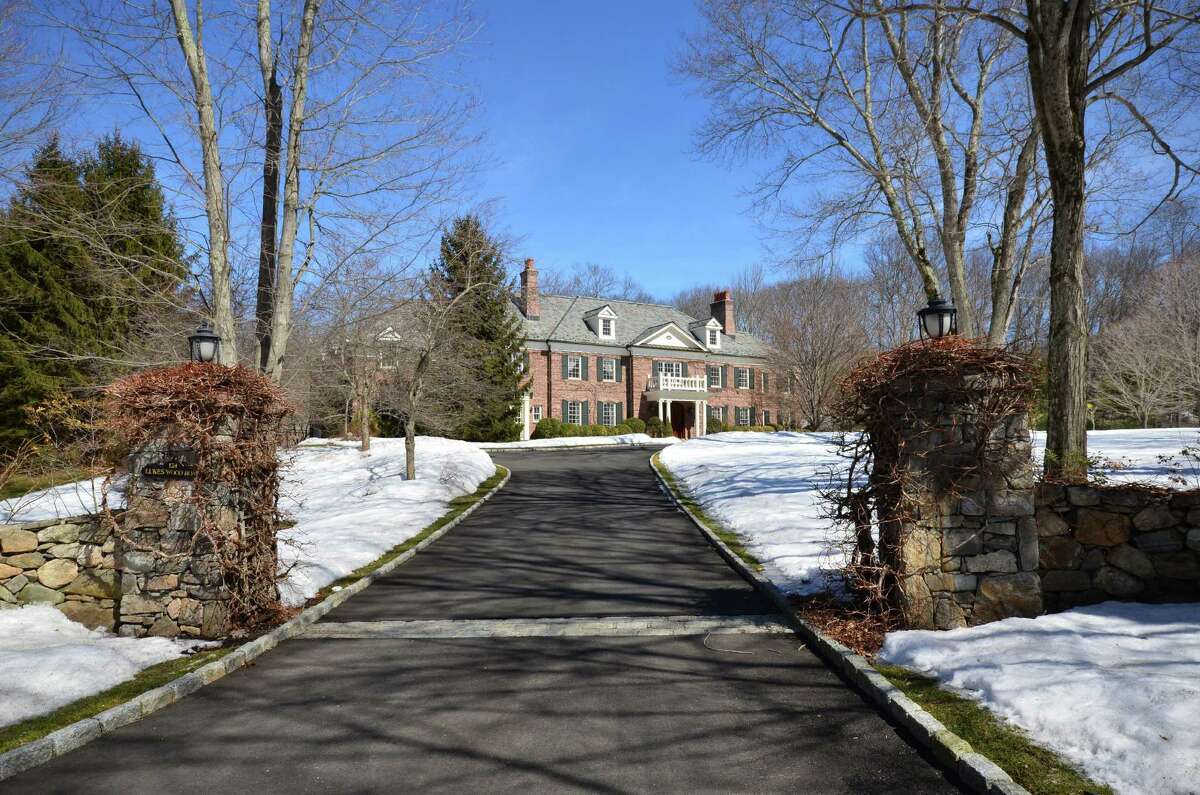 This stately property at 124 Lukes Wood Road can be yours for $ 4,995,000.