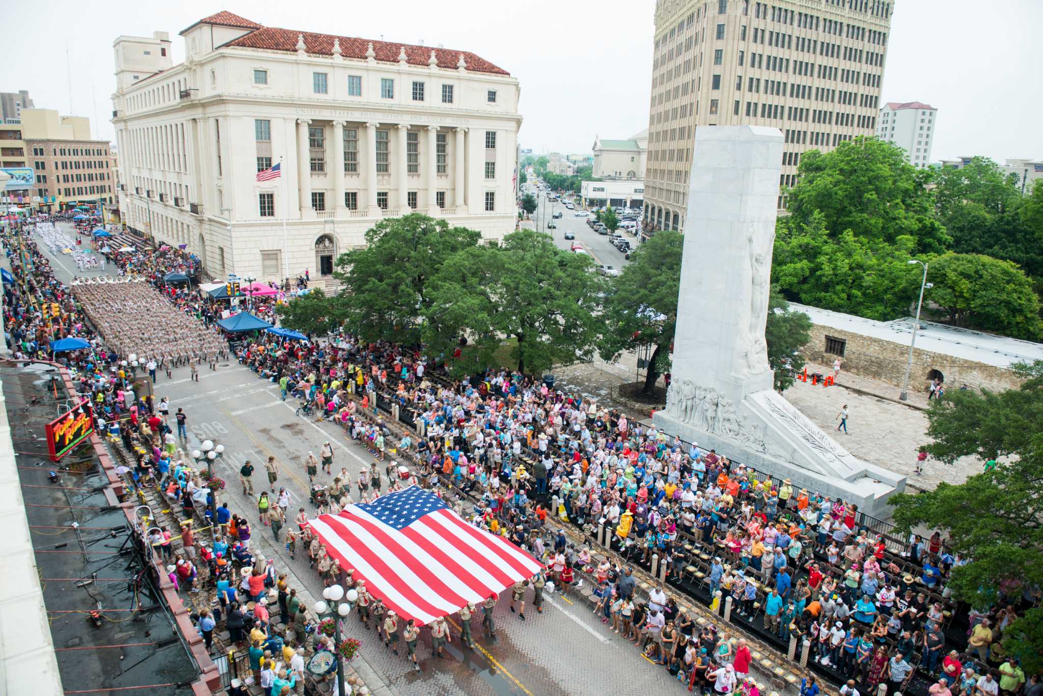 Battle of Flowers shines on through wet streets