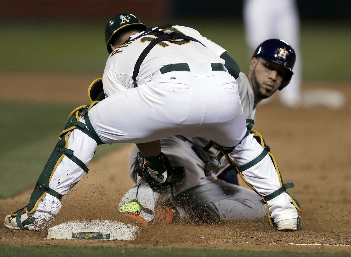 A's lose 5-4 to Astros - all scoring in extra innings