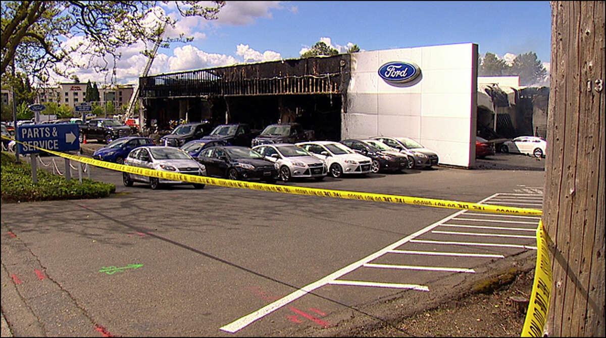 Crews battle stubborn fire at Bellevue Ford dealership