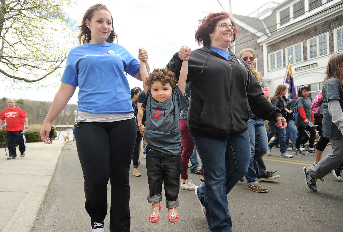 The annual Walk A Mile In Her Shoes event at Lisman Landing on Factory Lane in Milford, Conn. on Sunday, April 26, 2015.