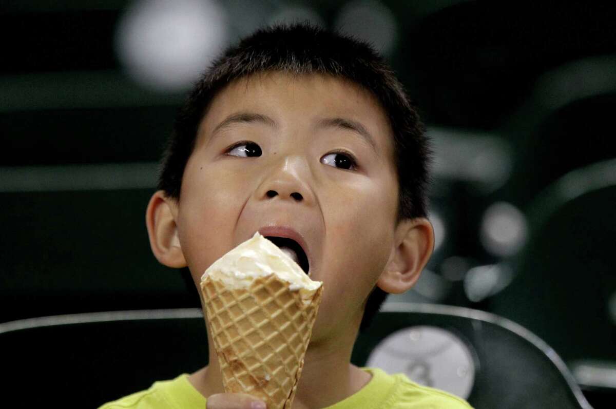 Jeffrey Peng, 5, enjoyed a Blue Bell ice cream cone during the Astros' last homestand.
