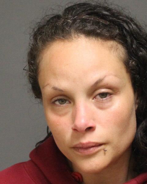 Cops: Woman on drugs passed out in car with kids