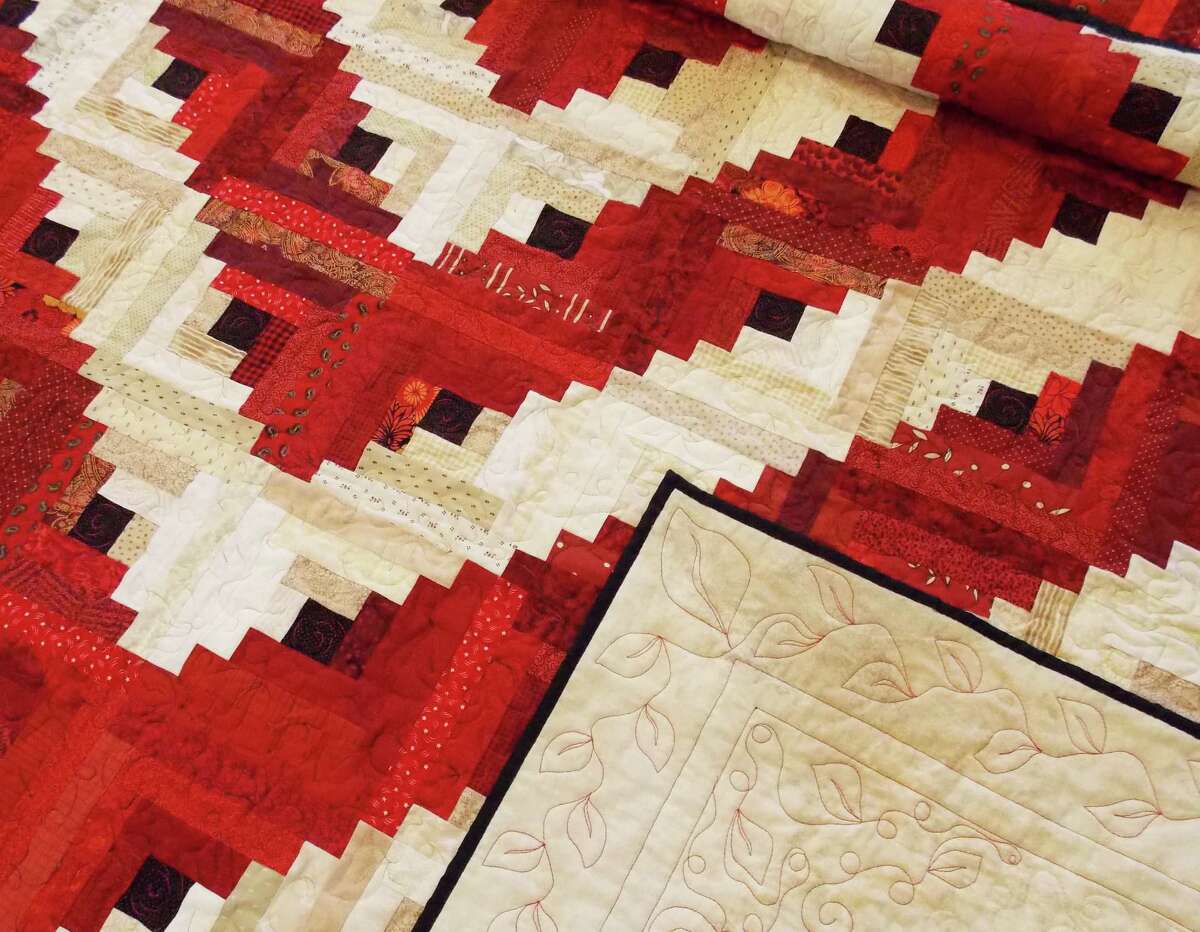 The Kent Quilters will present a log cabin quilt to the Kent Memorial Library at a Saturday, May 2 reception at the Main Street (Route 7) library. Courtesy of the Kent Quilters