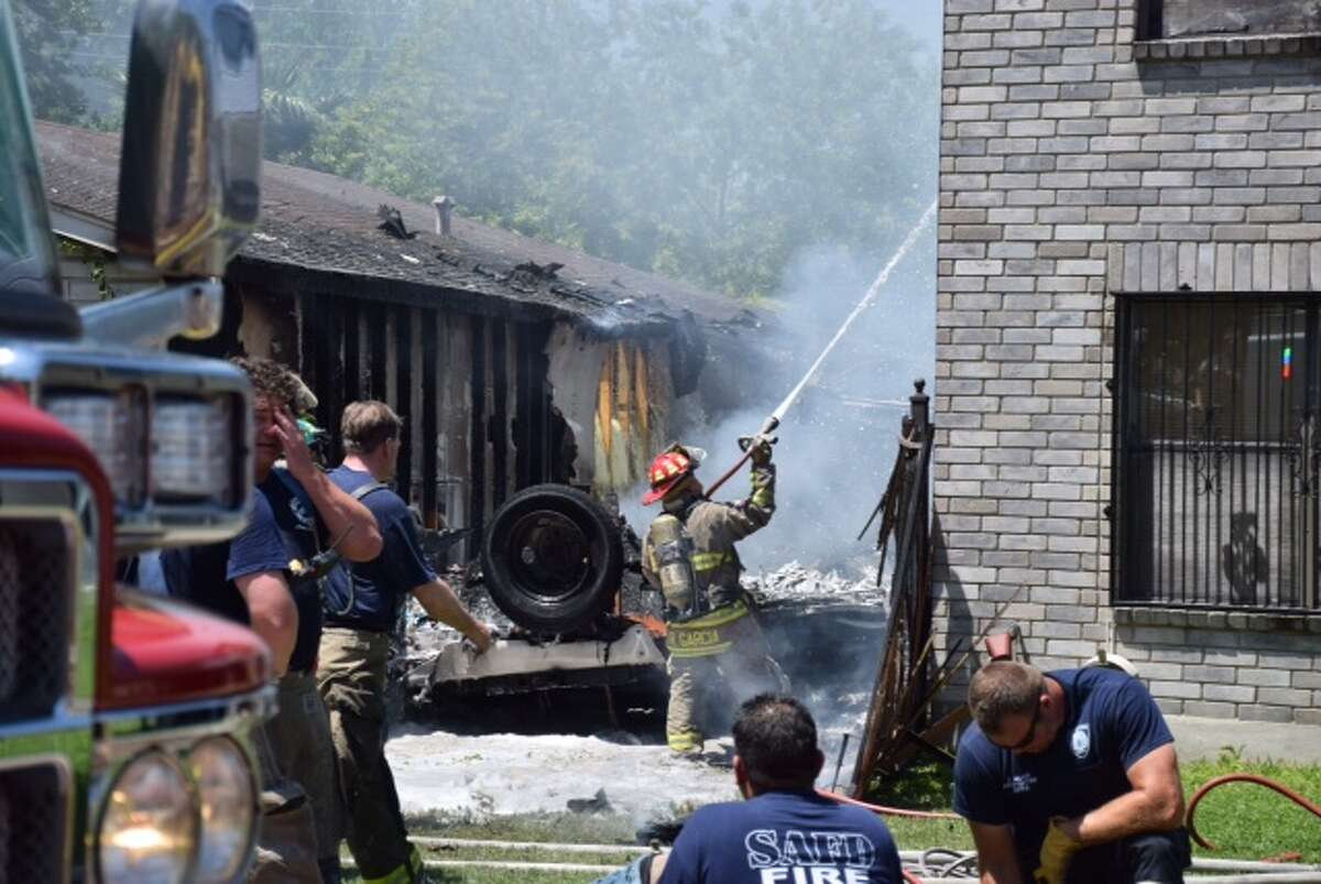 San Antonio Fire Department crews respond to a blaze in the 4000 block of Mystic Sunrise just after noon on April 27, 2015.