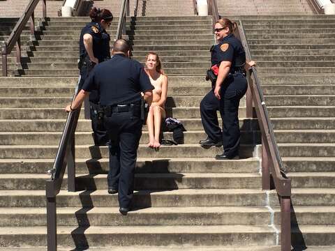 Texas State student sits nearly nude outside library for art project on