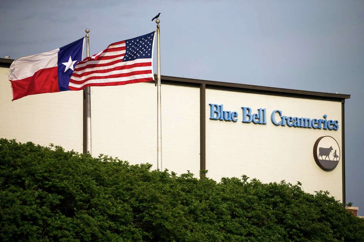 Flags flutter in the breeze outside of the Blue Bell Creameries on Thursday, April 23, 2015, in Brenham, Texas. Blue Bell issued its first recall in its 108 year history earlier this week after its products were linked to Listeria cases in four states. (Smiley N. Pool/The Dallas Morning News via AP)