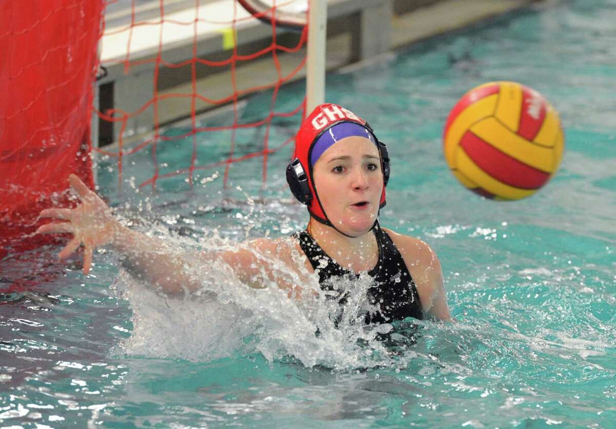 Greenwich High School water polo goalie Nicole Cutler makes a stop during the girls high school water polo match between Greenwich High School and Greenwich Academy at the Greenwich High School pool, Tuesday afternoon, April 28, 2015.