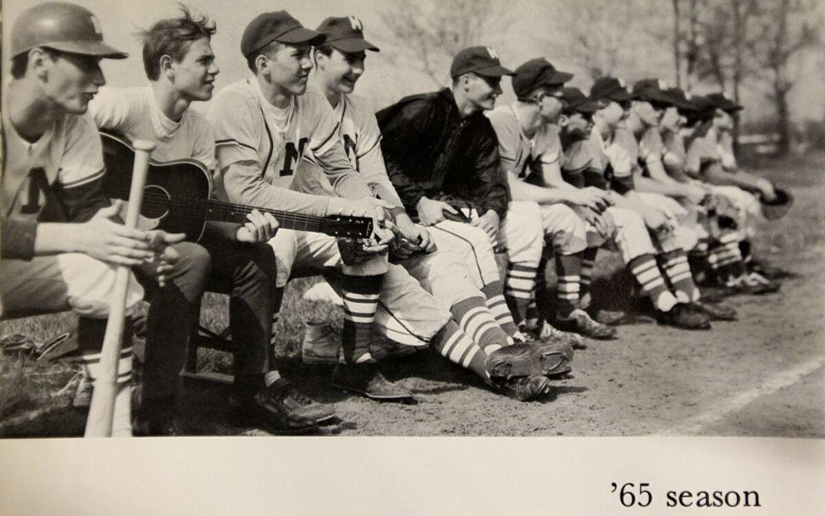San Antonio Spurs head coach Gregg Popovich , third from left, sits on the bench with the Merrillville High School baseball team in this yearbook photo. Popovich was born in East Chicago but grew up in Merrillville, Indiana. To the left with guitar is his best friend Arlie Pierce. They were both best man at their weddings.