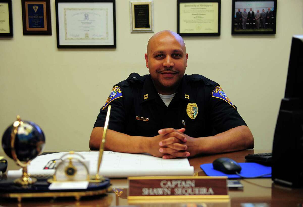 Shelton Police Department's Captain Shawn Sequeira at police headquarters in Shelton, Conn., on Wednesday Apr. 29, 2015. Sequeira is a retired Connecticut State Police officer and has come out of retirement to become the first black supervisor in Shelton police department history.