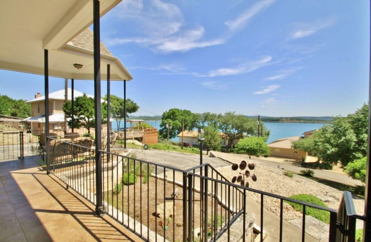 Address: 1119 OC Trout Drive, Canyon Lake, TX 78133 Size: 2,385 sq.ft. Bedrooms: 3 Bathrooms: 2.5 Year built: 1997 Acreage: .44 acres Neighborhood/HOA: Triple Peak Ranch Estates, voluntary Amenities: Gorgeous one-story lake home in immaculate condition! Expansive lake views, 748 sq.ft. of covered patio, gourmet island kitchen with $13,000 in GE Monogram appliances, induction cooktop and granite counters, formal dining, stone fireplace, Hunter Douglas blinds, large mudroom with storage, master retreat with luxury bath and no-step walk-in shower. GE GeoSpring high-efficiency water heater, low-maintenance brick exterior with aluminum fascia/soffit, 40-year high-impact roof, stone storage building, boat storage and extra parking.