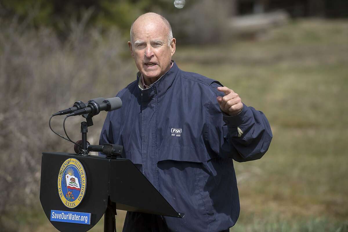California Gov. Jerry Brown speaks to members of the press during the annual snowpack survey in Phillips, Calif., on Wednesday, April 1, 2015. For the first time since measurements began in 1942, there was no snow to measure on this date. (Randall Benton/Sacramento Bee/TNS)