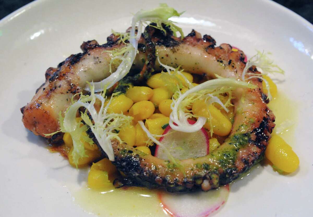 Octopus with saffron beans, N'duja and frisee at Peck's Arcade on Wednesday April 22, 2015 in Troy, N.Y. (Michael P. Farrell/Times Union)