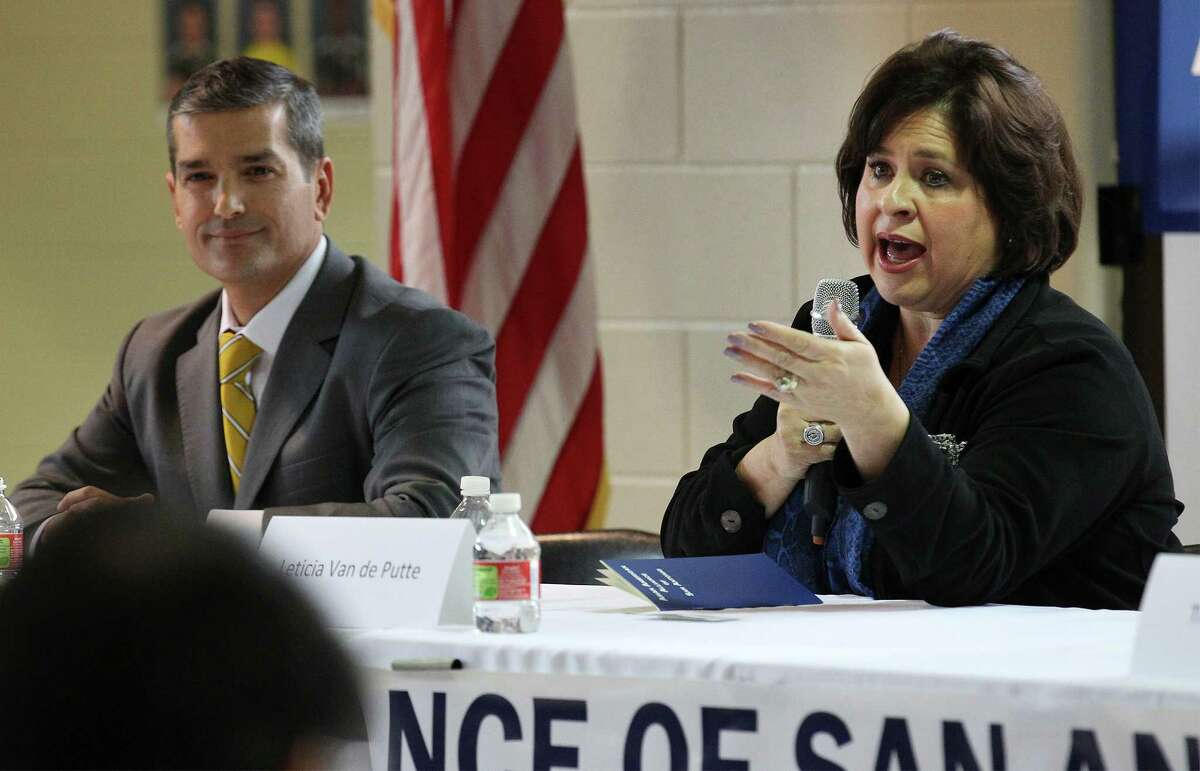 Mayoral candidates Leticia Van de Putte (right) and Mike Villarreal take part in a mayoral forum hosted by the Asian American Alliance of San Antonio held at Churchill High School on Saturday, Feb. 7, 2015. The two candidates, including Tommy Adkisson, fielded questions for nearly an hour and a half to a packed room of Asian American constituents. Topics included their visions of San Antonio, potential inclusion of Asian Americans in local government and future economic goals focused on local private business. (Kin Man Hui/San Antonio Express-News)
