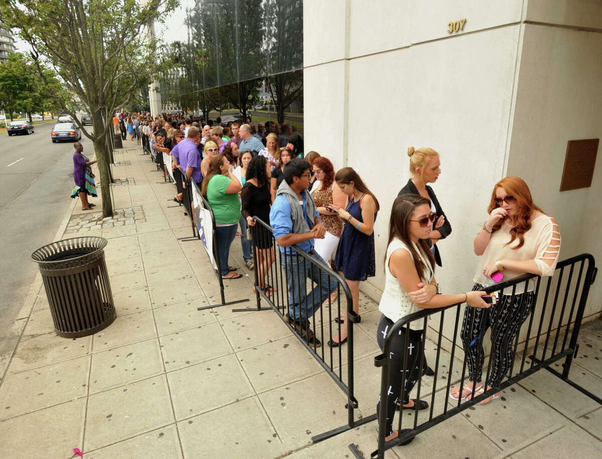 A line forms along the side of the Stamford Media Center for a taping of the Jerry Springer Show on Monday, Aug. 19, 2013.