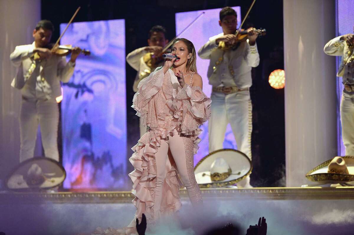 Jennifer Lopez performs musical tribute to Selena while performing with Los Dinos onstage at the 2015 Billboard Latin Music Awards presented bu State Farm on Telemundo at Bank United Center on April 30, 2015 in Miami, Florida.