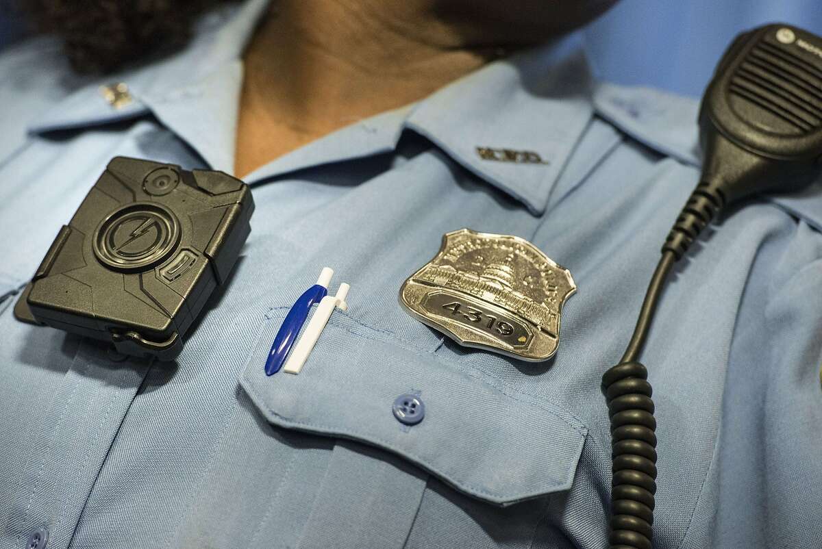 (FILES) This September 24, 2014 file photo shows a Washington DC Police Officer as she models a body camera before a press conference at City Hall in Washington, DC. US officials on May 1, 2015 announced a $20-million pilot program to help equip law enforcement agencies across the country with body cameras.The program is part of a general push by American police agencies to outfit officers with cameras to provide clear recordings of arrests, and is part of a proposal by President Barack Obama last year to invest $75 million to purchase 50,000 body cameras. AFP PHOTO/Brendan SMIALOWSKIBRENDAN SMIALOWSKI/AFP/Getty Images