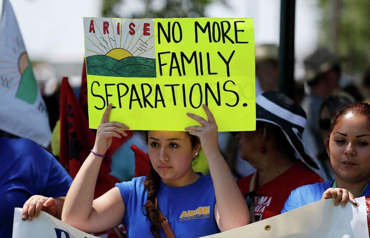 Jennifer Ramirez from the Rio Grande Valley area joins hundreds during the immigration detention march and protest in Dilley, Texas on Saturday, May 2, 2015.