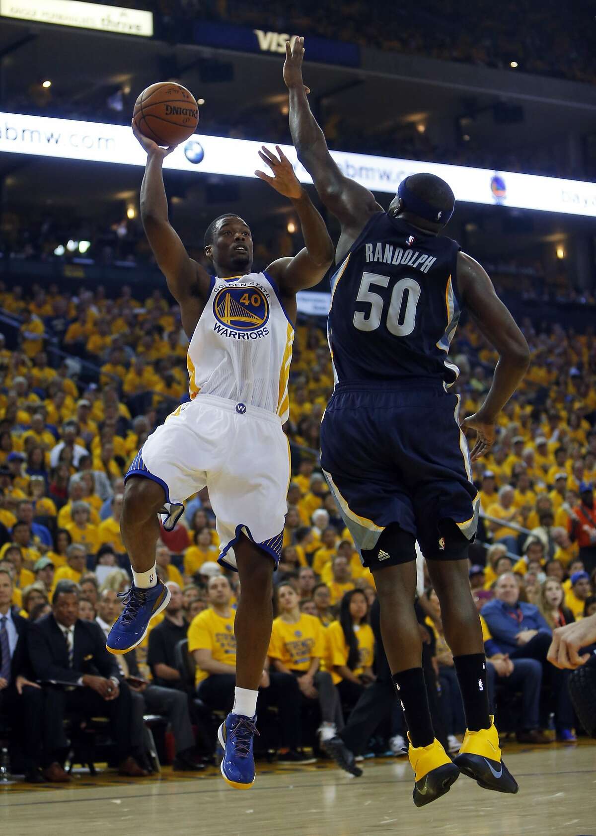 Golden State Warriors' Harrison Barnes scores over Memphis Grizzlies' Zach Randolph in 2nd quarter of Warriors' 101-86 win during Game 1 of NBA Playoffs' Western Conference Semifinals in Oakland, Calif., on Sunday, May 3, 2015.