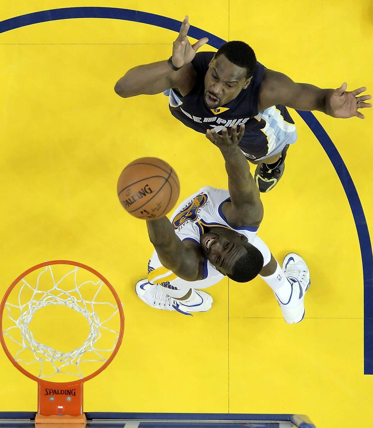 Draymond Green (23) defends against a shot by Tony Allen (9) during the second half. The Golden State Warriors played the Memphis Grizzlies at Oracle Arena in Oakland, Calif., in Game 1 of the Western Conference Semifinals on Sunday, May 3, 2015.