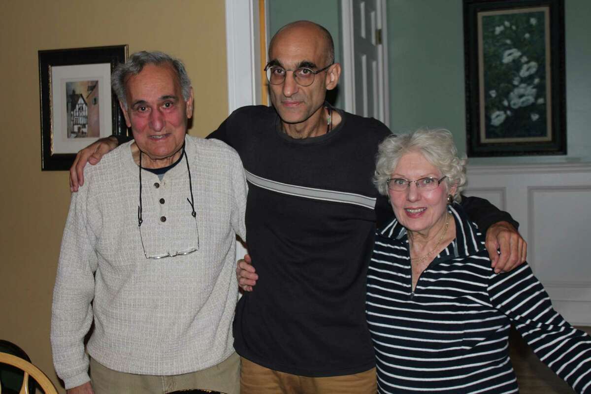 Dr. Tom Catena with his parents, Gene and Nancy, at Thanksgiving.