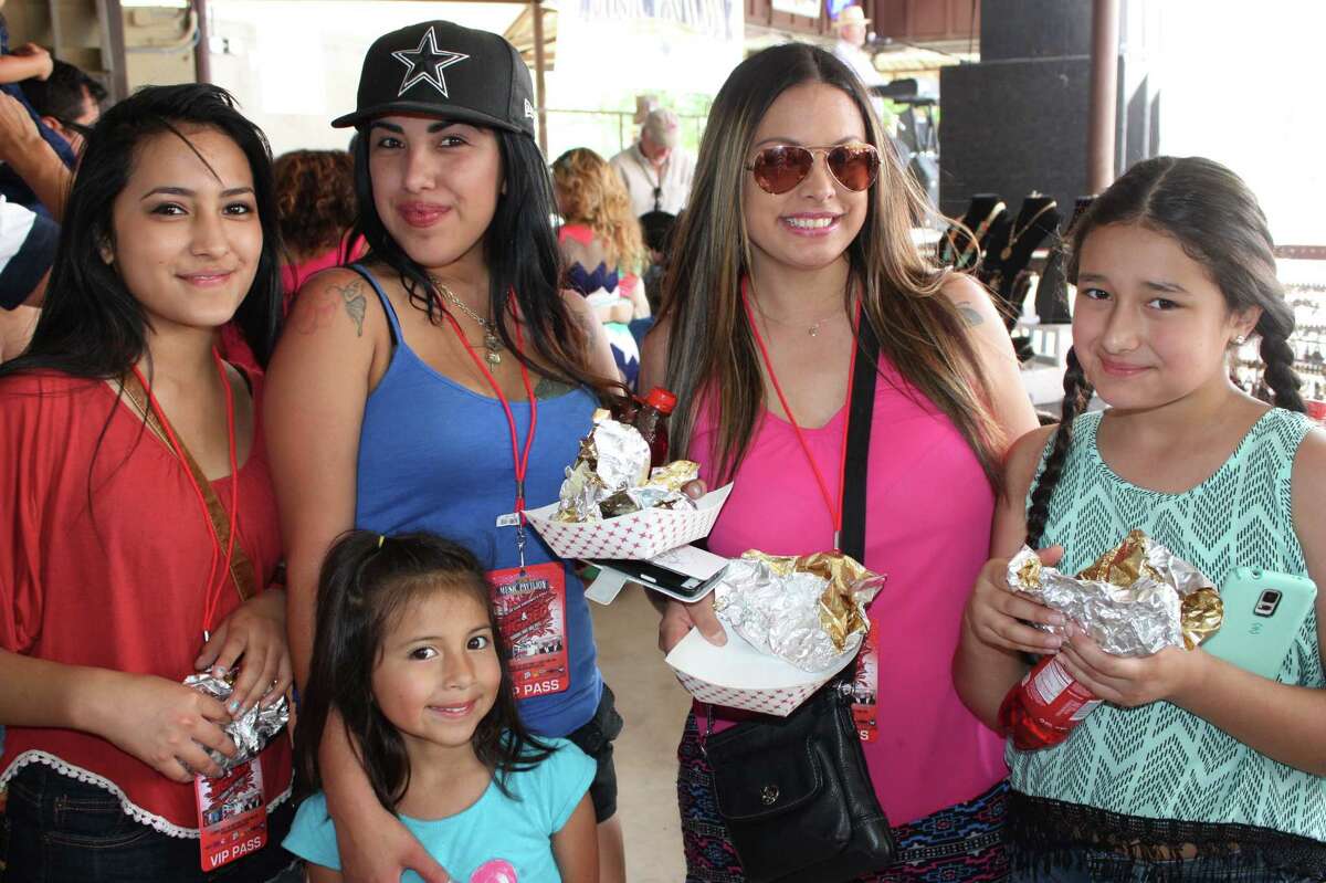 Fans of two San Antonio favorites chow down at the fifth annual Barbacoa & Big Red Festival at the R&J Music Pavilion on the South Side on Sunday, May 3, 2015.