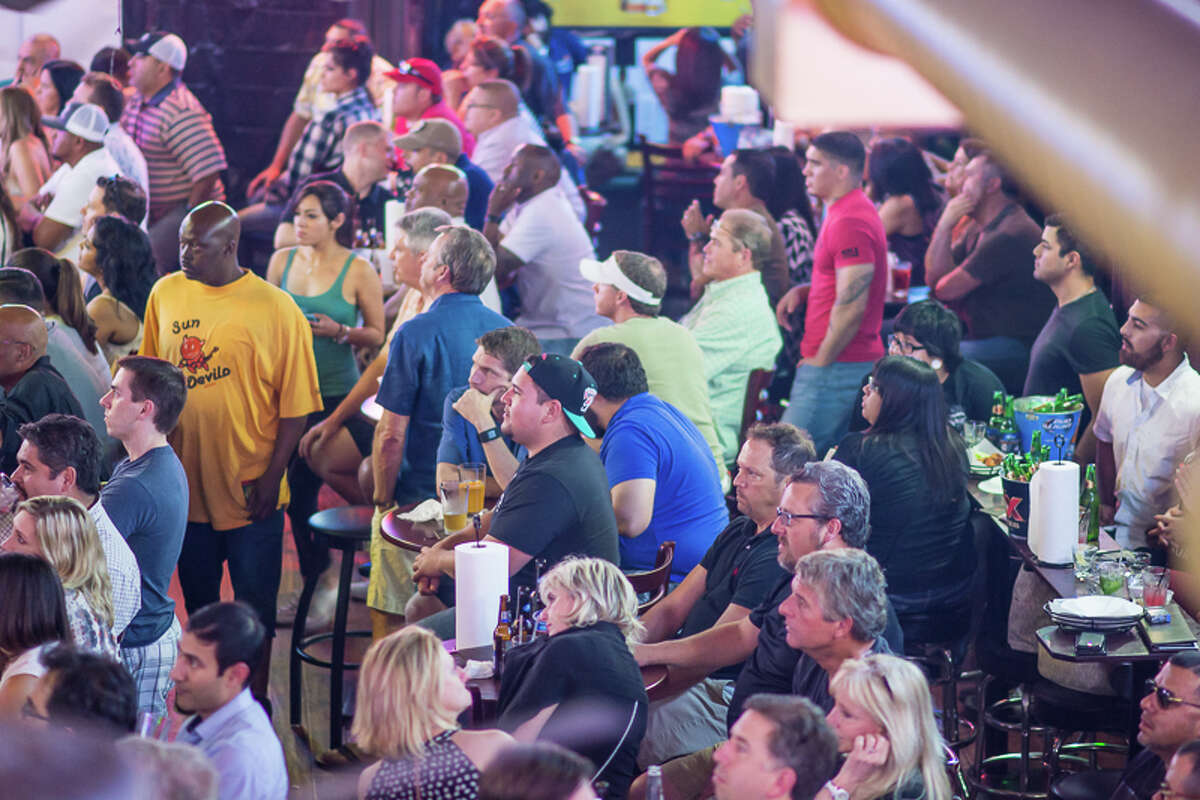 Boxing fans gather at The Ticket Sports Pub in downtown San Antonio to watch the Mayweather-Pacquiao fight on Saturday, May 2, 2015.