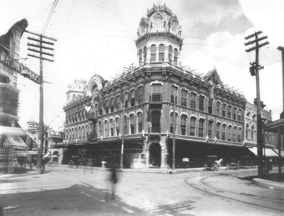 The Dullnig Store at Commerce and Alamo Streets is shown in this undated photo. Today, minus the cupolas, it's the Riverwalk Vista Hotel.