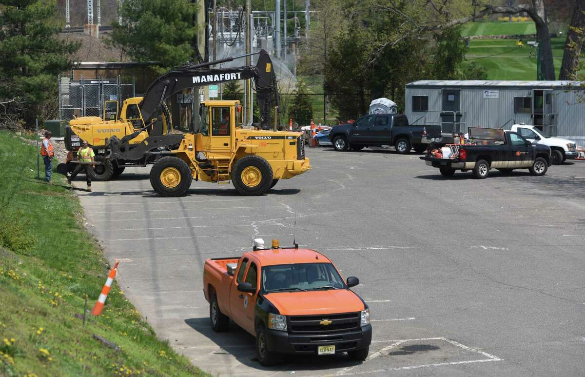 Construction crews set up a staging area for the start of the train bridge construction project in Old Greenwich, Conn. Monday, May 4, 2015. The project, scheduled for completion in 2018, will replace the old bridge crossing Sound Beach Avenue.