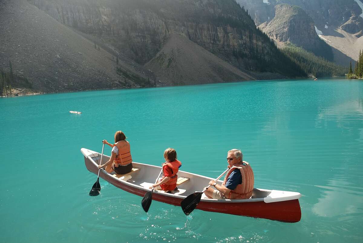 Late spring is an ideal time to canoe on uncrowded Moraine Lake.