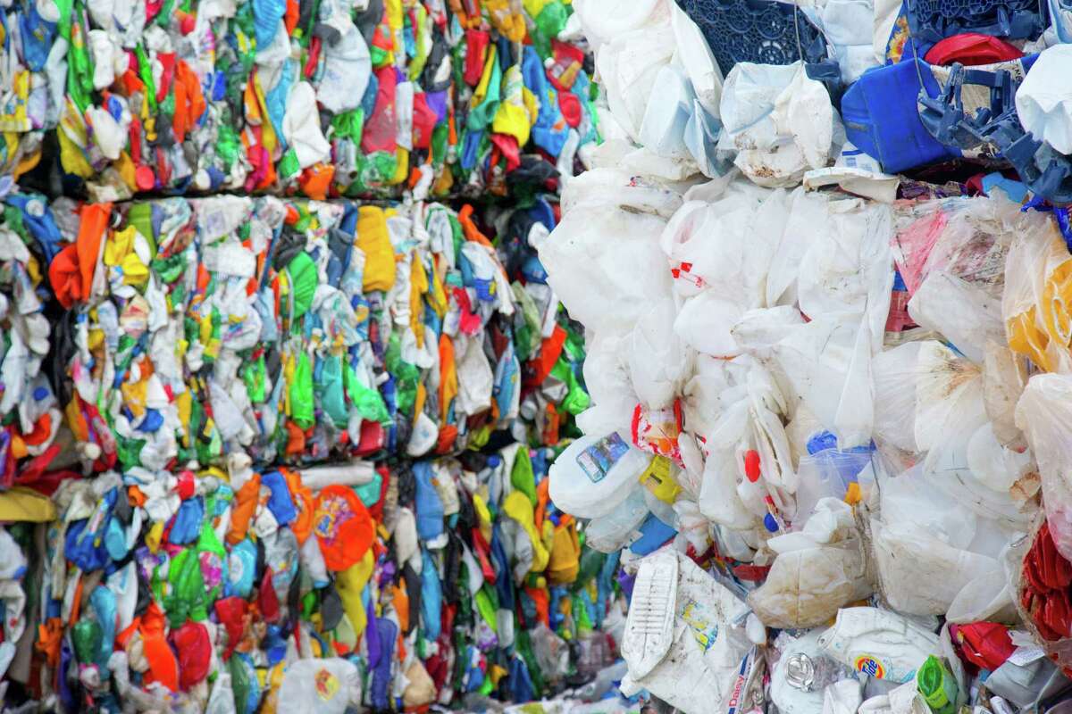 Bales of plastic that has been sorted and compressed at the Waste Management Recycling Facility Thursday November 20, 2014 in Southwest Houston, TX. (Billy Smith II / Houston Chronicle)