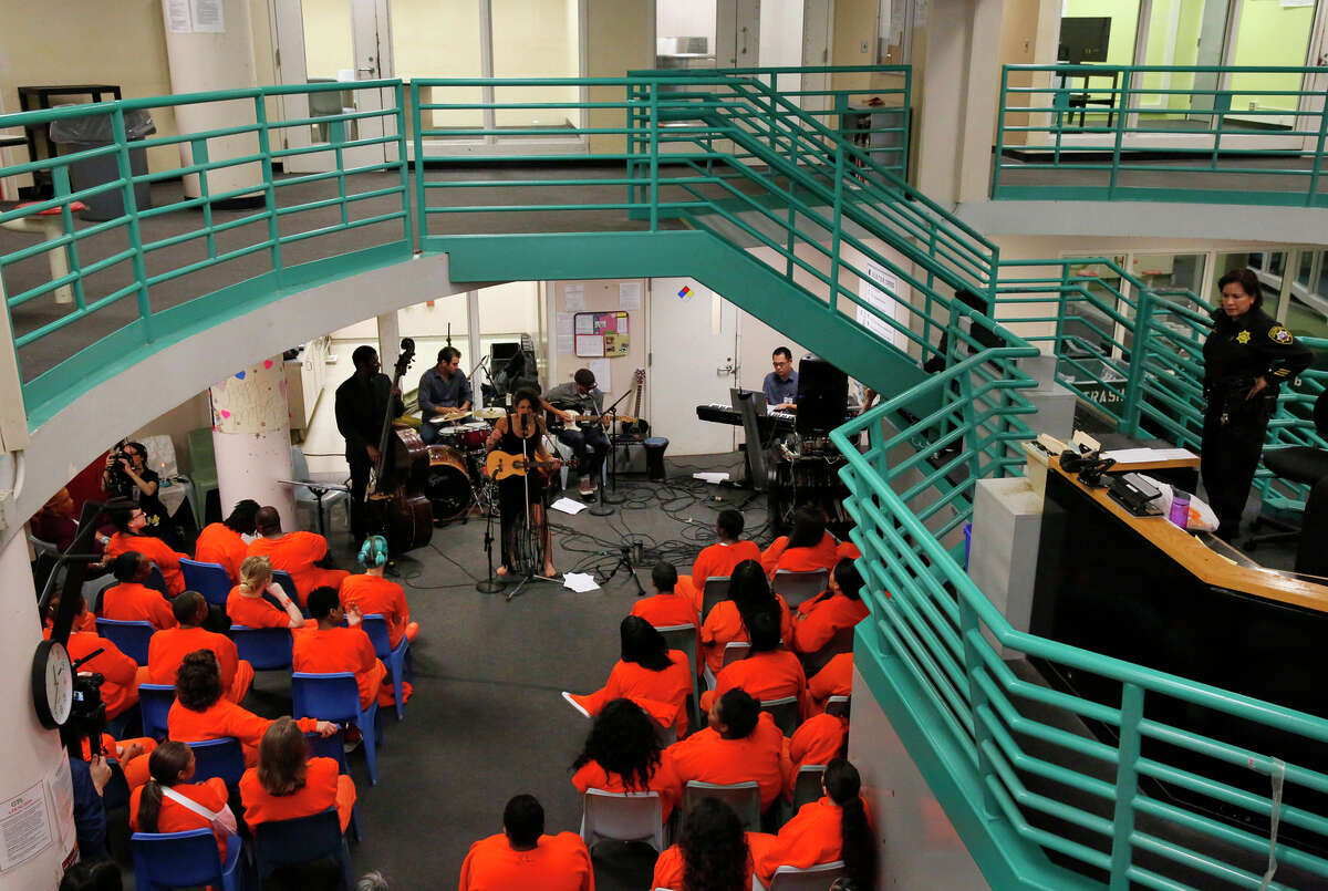 Naima Shalhoub and her band perform for a group of incarcerated women and media during a live recording of Shalhoub’s debut album, “Borderlands,” in E Pod at the County Jail.
