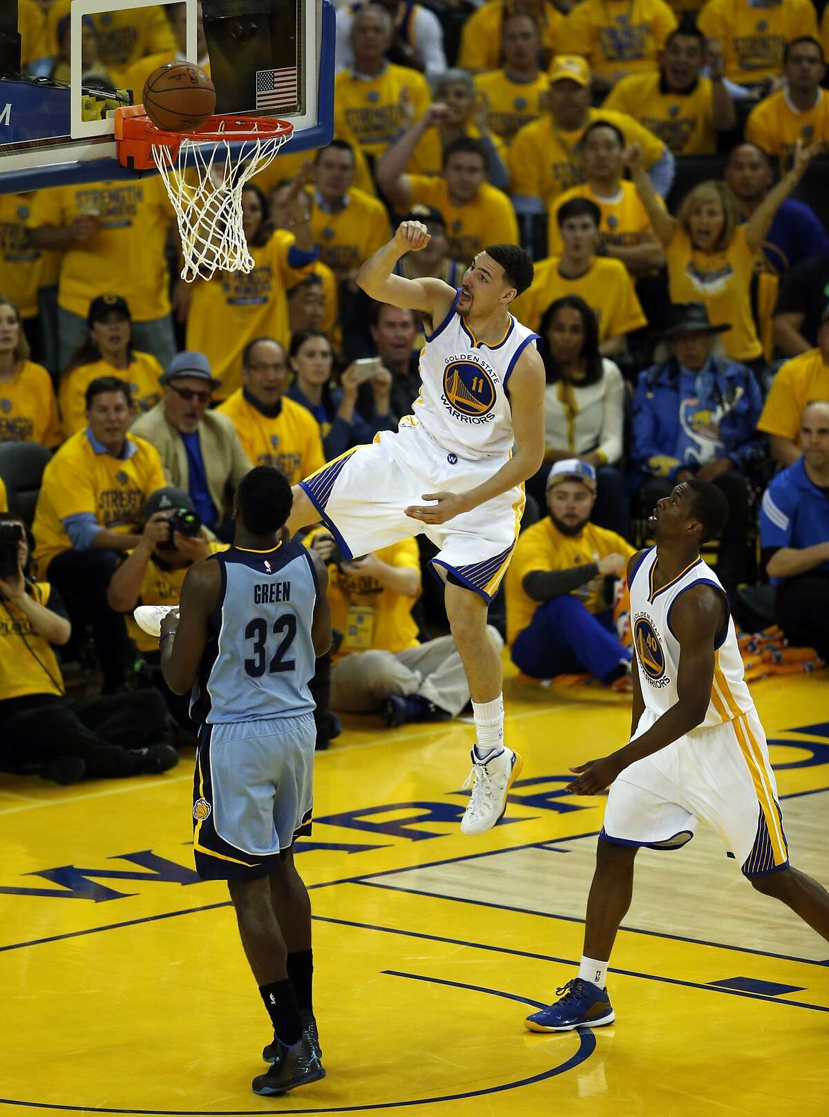 Golden State Warriors' Klay Thompson misses a dunk in 2nd quarter against Memphis Grizzlies' Jeff Green during Game 2 of NBA Playoffs' Western Conference Semifinals at Oracle Arena in Oakland, Calif., on Tuesday, May 5, 2015.