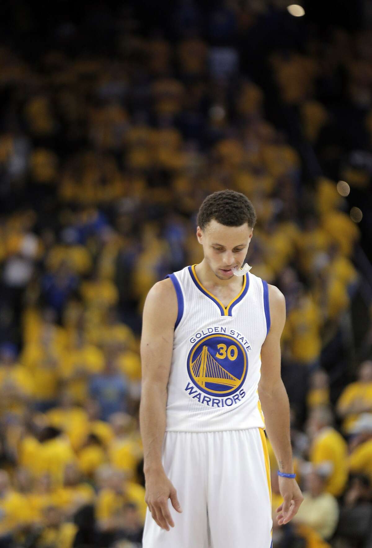 Stephen Curry (30) walks up the court after the Warriors fouled during the final moments of the second half. The Golden State Warriors played the Memphis Grizzlies at Oracle Arena in Oakland, Calif., in Game 2 of the Western Conference Semifinals on Tuesday, May 5, 2015.