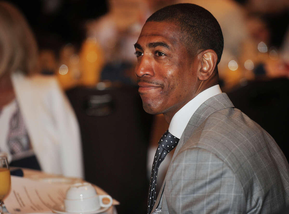 UCONN Men's basketball coach Kevin Ollie is introduced as the celebrity speaker at the annual St. Vincent's Swim Across the Sound benefit breakfast at the Holiday Inn in Bridgeport, Conn. on Wednesday, May 6, 2015.