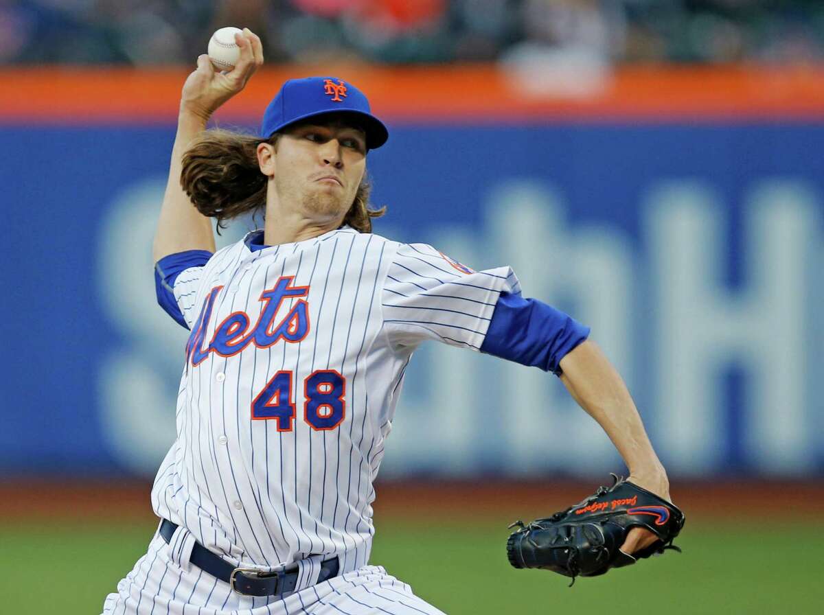 New York Mets starting pitcher Jacob deGrom delivers in the first inning of a baseball game against the Baltimore Orioles, Wednesday, May 6, 2015, in New York. (AP Photo/Kathy Willens) ORG XMIT: NYM101