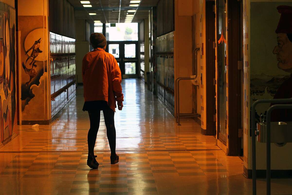 A student walks back to her class at the Ruth Asawa San Francisco School of the Arts, Wednesday, May 6, 2015, in San Francisco, Calif. The S.F. school board is considering changes to the school enrollment because there are too many out-of-towners and not enough diversity.