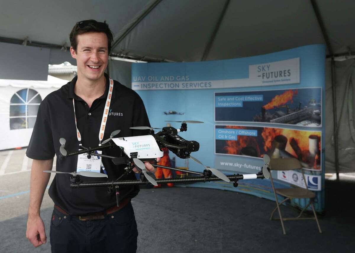 James Harrison, CEO of Sky-Futures, shows one of the British company's drones. Each drone costs about $50,000, Harrison says, mostly for the high-definition onboard camera and the software that keeps the craft stable in winds up to 33 mph.﻿