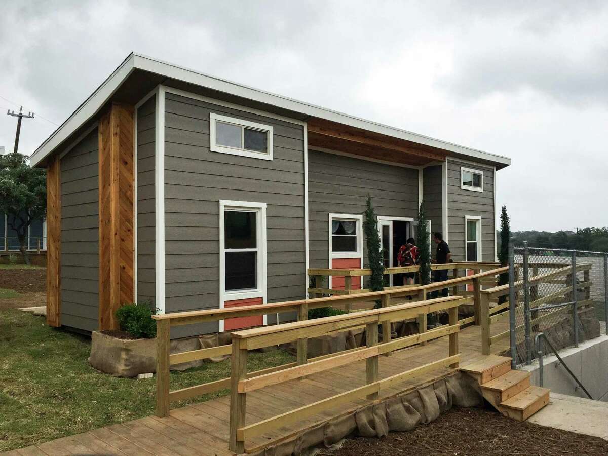 This tiny home's theme, ADA/Disability, provides adjustments to a typical home setup by allowing for larger entryways for wheelchairs, lower positioning for light switches and other changes.