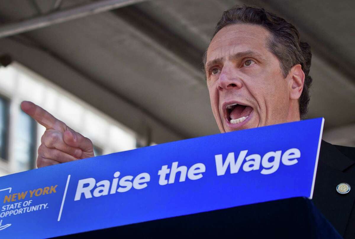 Gov. Andrew Cuomo speaks during a labor rally, announcing a plan to get a minimum $15 an hour wage hike for fast-food workers, Thursday, May 7, 2015, in New York. Cuomo is proposing a plan to get a minimum wage hike that doesn't require legislative approval. Cuomo said he will direct the state labor commissioner to examine the minimum wage in the fast-food industry. (AP Photo/Bebeto Matthews) ORG XMIT: NYBM101