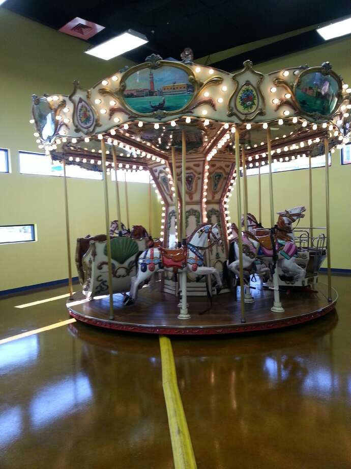 El Paso dentist reopens office with movie theater, arcade and carousel